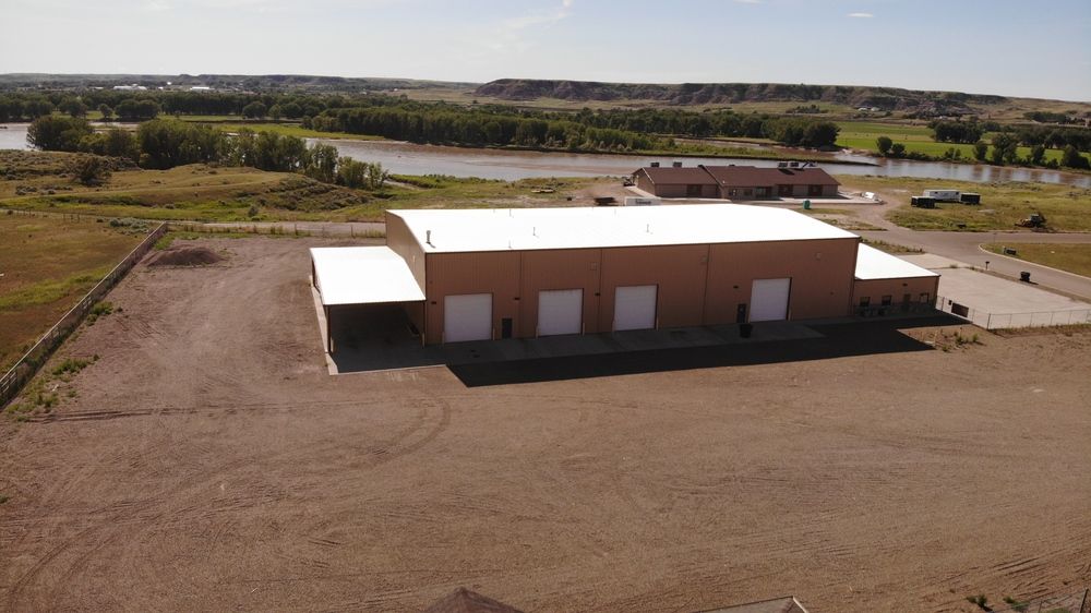 Functional +/-18,000+ SQ FT Shop on 3.11 Acres in Glendive, MT: 123 W Oregon Ln, Glendive, MT 59330